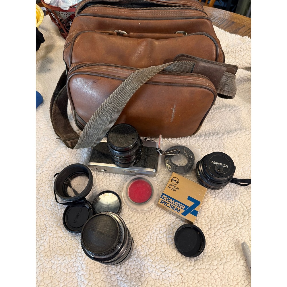 Vintage Minolta SLR Film Camera Bundle with Lenses Filters and Brown Bag‎